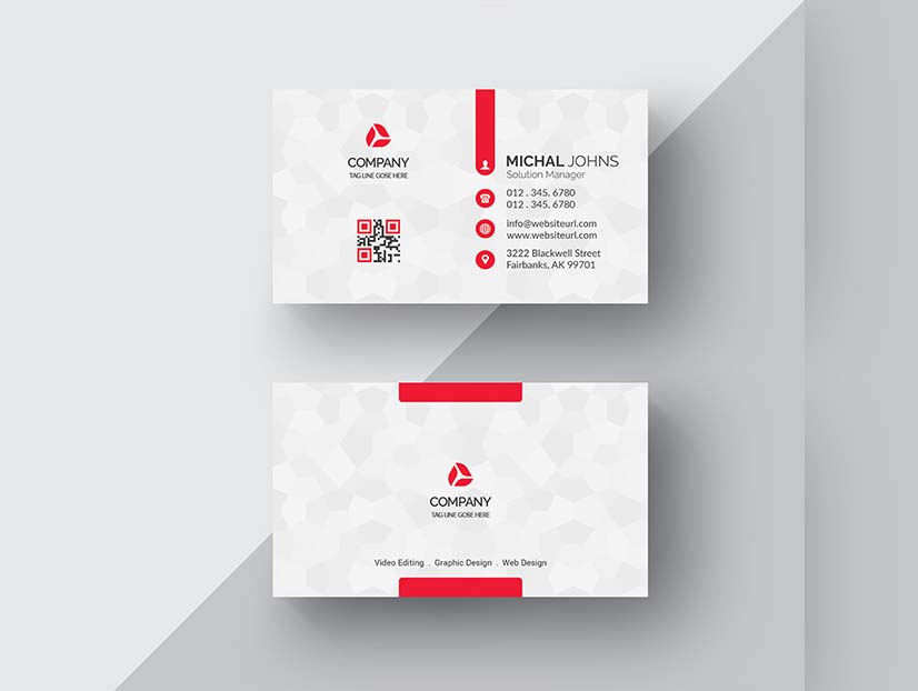 white business card with red details